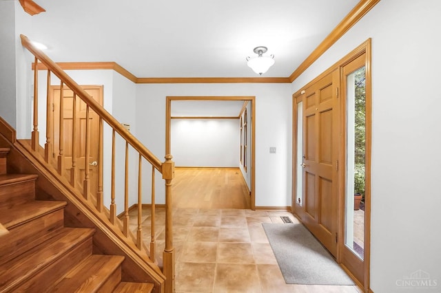 3057 Fox Den Ln, Anderson Twp, OH 45244 - entryway featuring stairs and crown molding