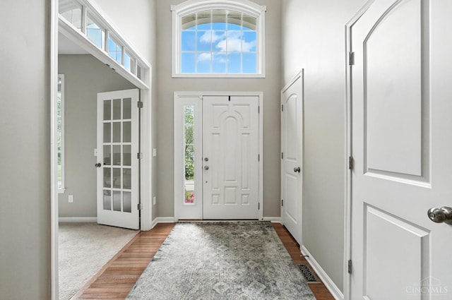 10285 Plantation Pointe Dr, Symmes Twp, OH 45140 - entryway featuring wood finished floors, french doors, and a high ceiling