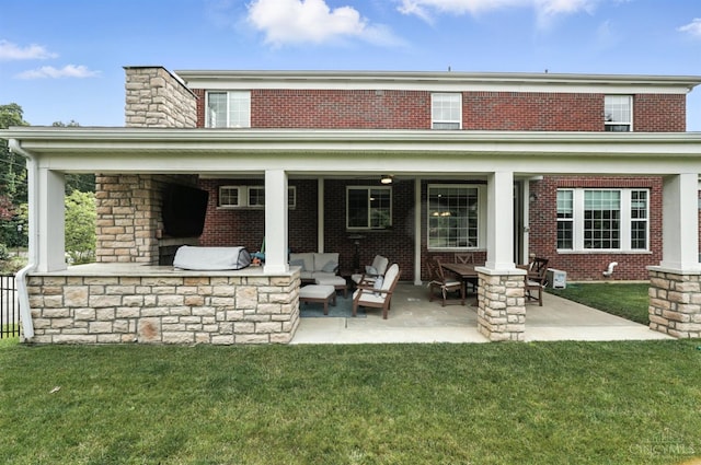 10285 Plantation Pointe Dr, Symmes Twp, OH 45140 - back of house featuring a patio, brick siding, an outdoor living space, and a yard