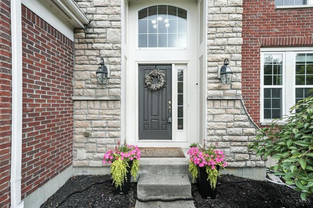 10285 Plantation Pointe Dr, Symmes Twp, OH 45140 - property entrance featuring brick siding