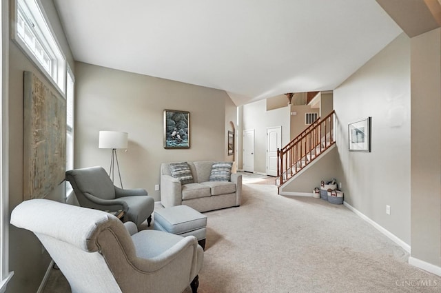 10285 Plantation Pointe Dr, Symmes Twp, OH 45140 - living room featuring stairway and carpet floors