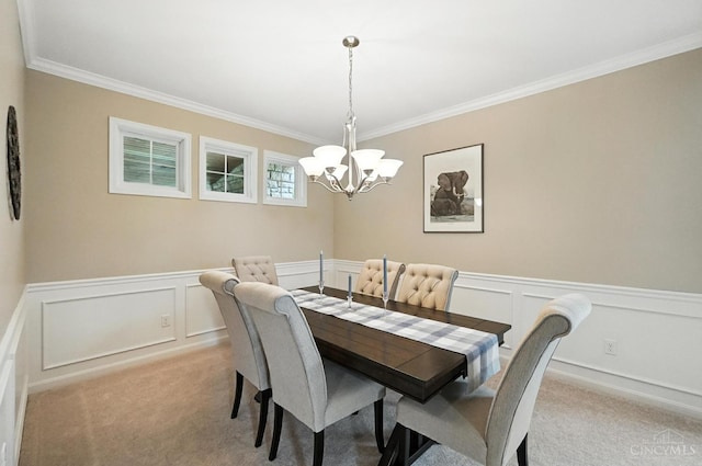 10285 Plantation Pointe Dr, Symmes Twp, OH 45140 - dining room featuring light carpet, ornamental molding, a chandelier, a decorative wall, and a wainscoted wall