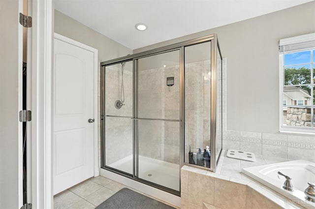 10285 Plantation Pointe Dr, Symmes Twp, OH 45140 - full bathroom with tile patterned floors, a shower stall, a bath, and recessed lighting