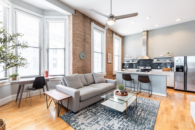 1201 Vine St Unit C, Cincinnati, OH 45202 - living area featuring light wood finished floors, a ceiling fan, and recessed lighting