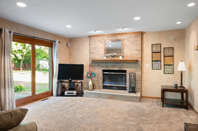 1662 W Kemper Rd, Springfield Twp, OH 45240 - carpeted living area featuring a fireplace and recessed lighting