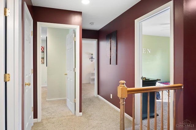 1662 W Kemper Rd, Springfield Twp, OH 45240 - corridor with carpet and an upstairs landing