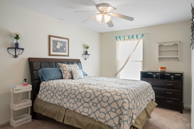 1662 W Kemper Rd, Springfield Twp, OH 45240 - carpeted bedroom featuring a ceiling fan and baseboards