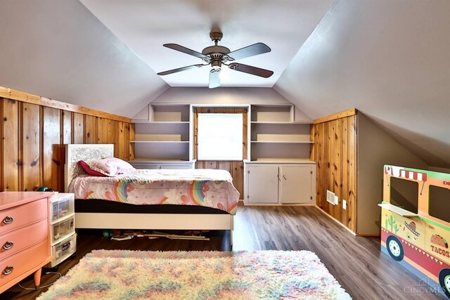 2872 Sheldon Ave, Cincinnati, OH 45239 - bedroom with wood finished floors, wood walls, vaulted ceiling, and a ceiling fan