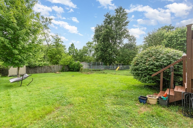 6579 Sherman Ave, Anderson Twp, OH 45230 - fenced backyard with a trampoline and a storage shed