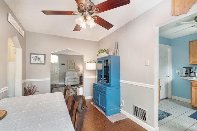 6579 Sherman Ave, Anderson Twp, OH 45230 - dining room featuring a ceiling fan and baseboards