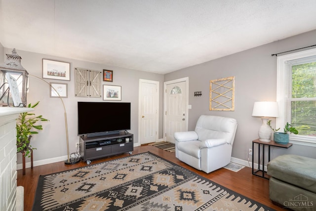 6579 Sherman Ave, Anderson Twp, OH 45230 - living area with baseboards and wood finished floors