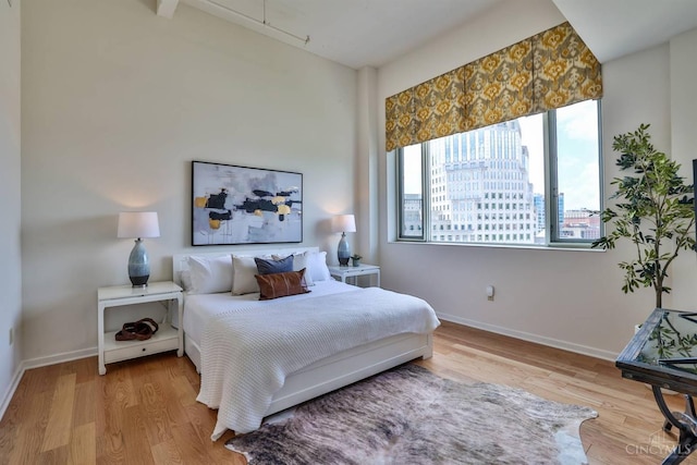 400 Pike St Unit 921, Cincinnati, OH 45202 - bedroom with wood finished floors and baseboards