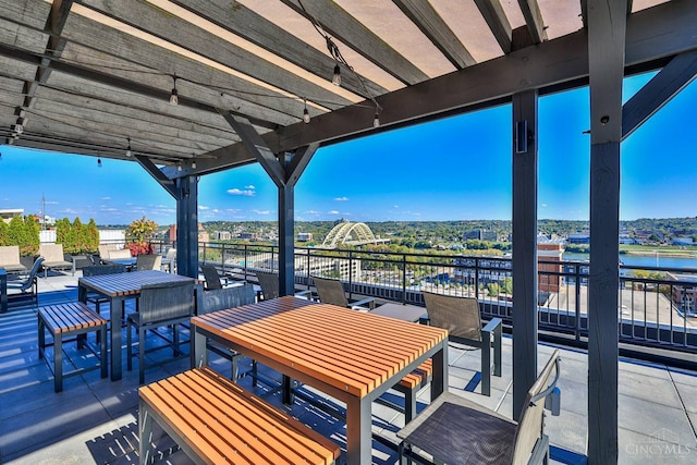 400 Pike St Unit 921, Cincinnati, OH 45202 - view of patio with outdoor dining space, a water view, and a pergola