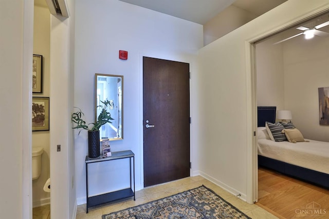 400 Pike St Unit 921, Cincinnati, OH 45202 - foyer with light tile patterned floors and baseboards