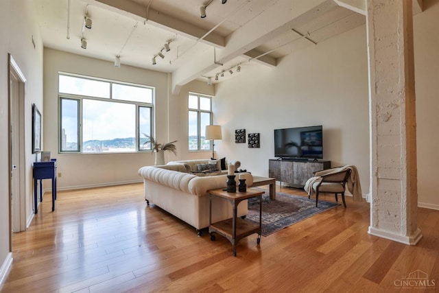 400 Pike St Unit 921, Cincinnati, OH 45202 - living area featuring track lighting and light wood-style flooring