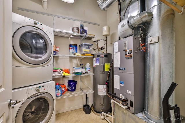 400 Pike St Unit 921, Cincinnati, OH 45202 - laundry area with electric water heater and stacked washer / drying machine