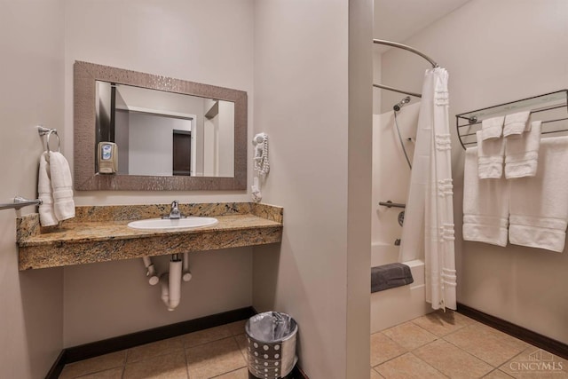 400 Pike St Unit 921, Cincinnati, OH 45202 - bathroom featuring tile patterned floors and shower / bath combo
