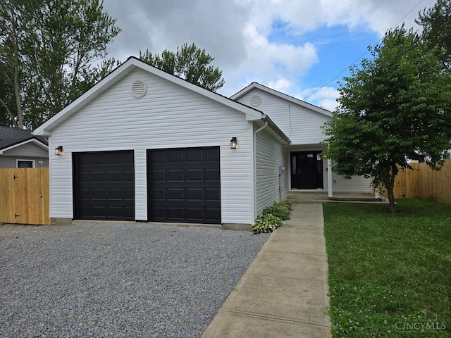 423 Howard St, Wilmington, OH 45177 - ranch-style home with a garage and driveway
