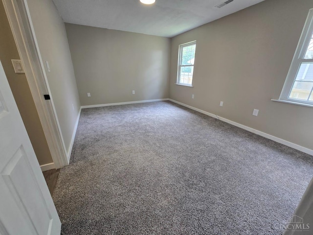 423 Howard St, Wilmington, OH 45177 - empty room with carpet and baseboards