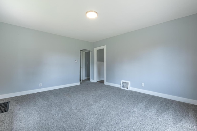 2456 Wilbraham Rd, Middletown, OH 45042 - carpeted spare room featuring baseboards and arched walkways