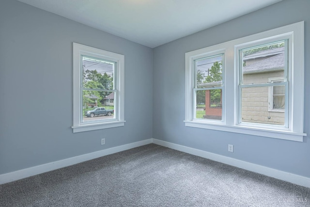 2456 Wilbraham Rd, Middletown, OH 45042 - carpeted empty room with healthy amount of natural light