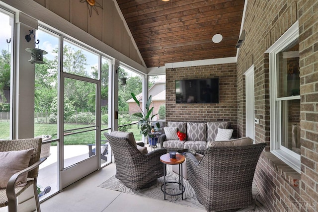 1439 Legacy Ct, Troy, OH 45373 - sunroom with outdoor lounge area, lofted ceiling, and plenty of natural light