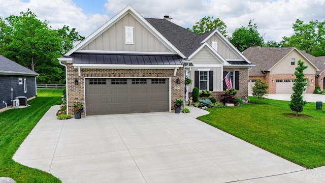 1439 Legacy Ct, Troy, OH 45373 - craftsman inspired home with board and batten siding, brick siding, concrete driveway, and a chimney