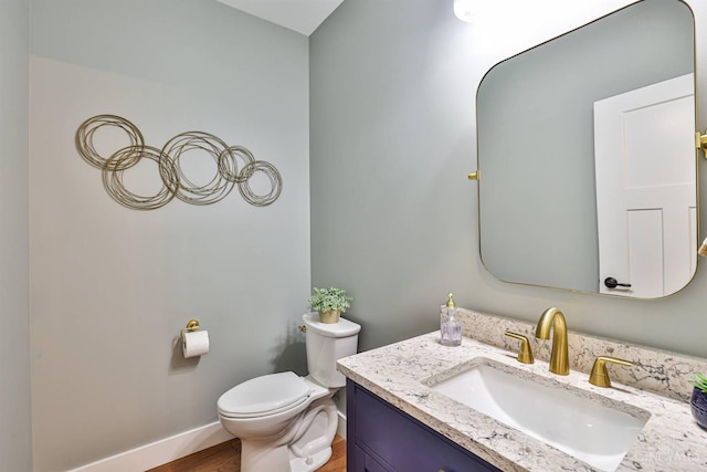 1439 Legacy Ct, Troy, OH 45373 - half bathroom with vanity and wood finished floors
