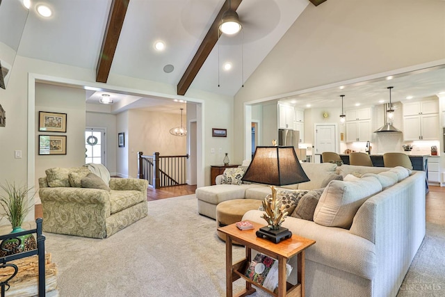 1439 Legacy Ct, Troy, OH 45373 - living room featuring high vaulted ceiling, beamed ceiling, recessed lighting, a ceiling fan, and light wood-type flooring