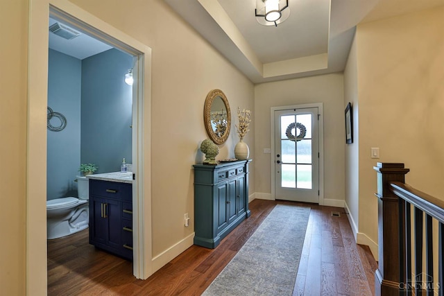 1439 Legacy Ct, Troy, OH 45373 - foyer entrance with dark wood finished floors and a tray ceiling