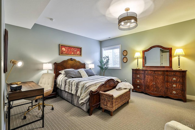 1439 Legacy Ct, Troy, OH 45373 - carpeted bedroom with a desk and baseboards
