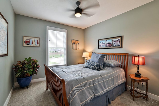 1439 Legacy Ct, Troy, OH 45373 - carpeted bedroom with baseboards and a ceiling fan