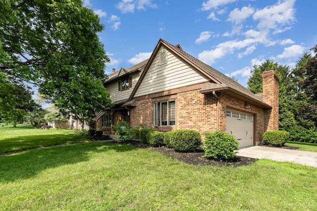 501 Tara Oaks Dr, Middletown, OH 45042 - view of home's exterior featuring a chimney, brick siding, a garage, and a lawn