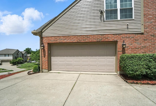 4870 Highland Oaks Dr, Green Twp, OH 45248 - garage featuring concrete driveway