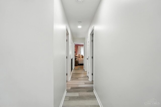 4870 Highland Oaks Dr, Green Twp, OH 45248 - corridor with baseboards and light wood-style flooring
