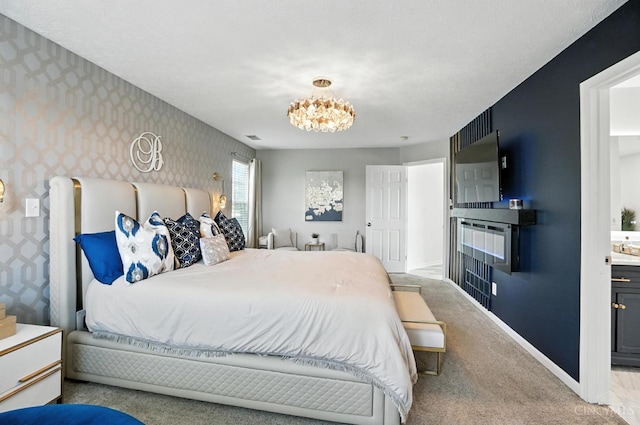 4870 Highland Oaks Dr, Green Twp, OH 45248 - bedroom featuring wallpapered walls, carpet flooring, and a chandelier