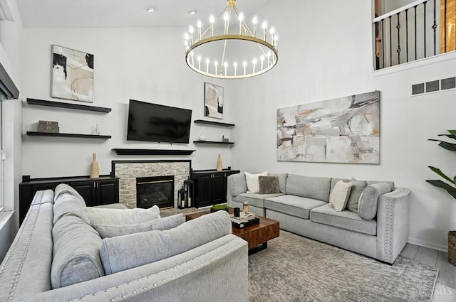 4870 Highland Oaks Dr, Green Twp, OH 45248 - living room with a chandelier, a fireplace, recessed lighting, and a towering ceiling