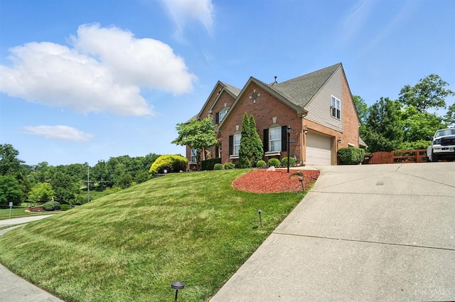 4870 Highland Oaks Dr, Green Twp, OH 45248 - view of front facade featuring concrete driveway, brick siding, and a garage