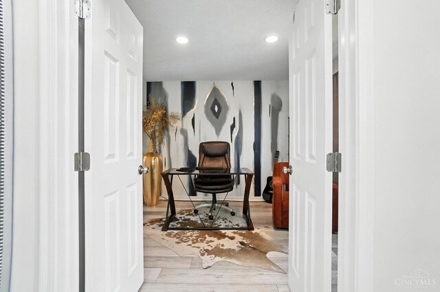 4870 Highland Oaks Dr, Green Twp, OH 45248 - living area featuring wood finished floors, recessed lighting, a desk, and a heating unit