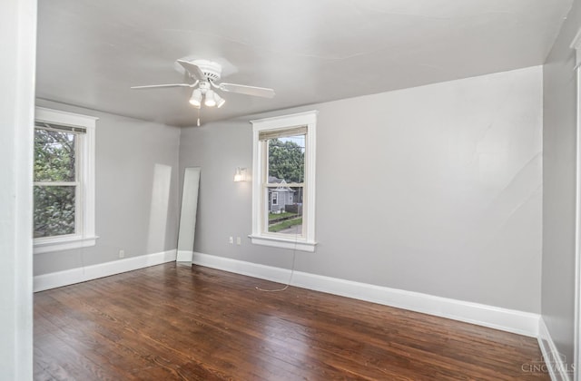 197 Millville, Hamilton, OH 45013 - unfurnished room with healthy amount of natural light, dark wood-style flooring, and a ceiling fan