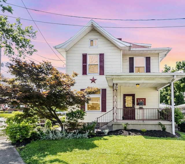 197 Millville, Hamilton, OH 45013 - view of front of property featuring a porch and a lawn