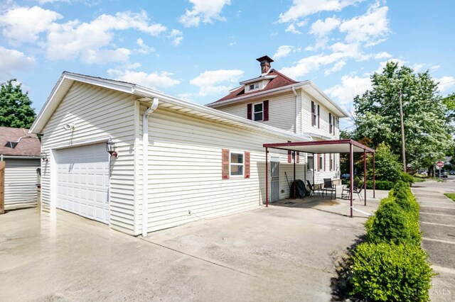 197 Millville, Hamilton, OH 45013 - view of side of property with driveway and a patio area