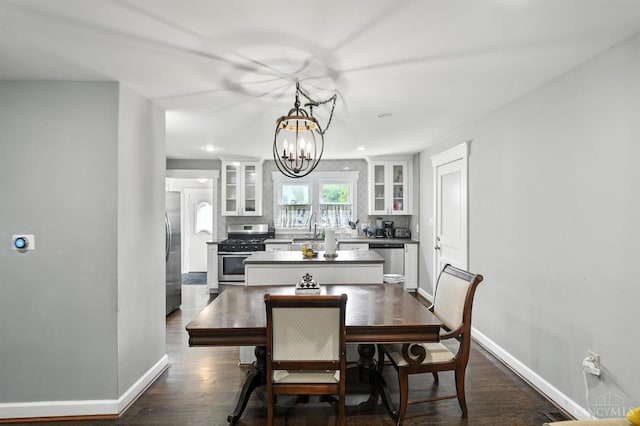 668 Shawhan Rd, Union Twp, OH 45065 - dining room with a chandelier and dark wood-style floors