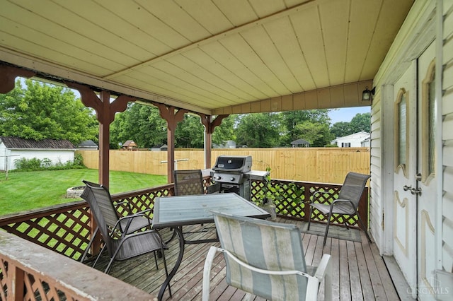 668 Shawhan Rd, Union Twp, OH 45065 - wooden deck featuring outdoor dining space, a fenced backyard, and a grill