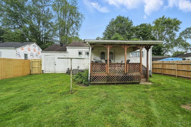 668 Shawhan Rd, Union Twp, OH 45065 - back of property with a fenced backyard and a storage unit