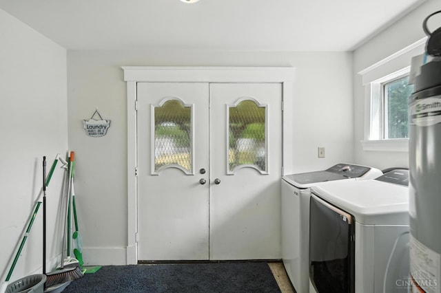 668 Shawhan Rd, Union Twp, OH 45065 - laundry area with separate washer and dryer and baseboards