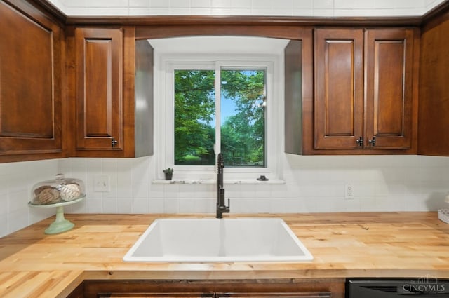 2000 Neeb Rd, Green Twp, OH 45233 - kitchen with wooden counters, decorative backsplash, and black dishwasher