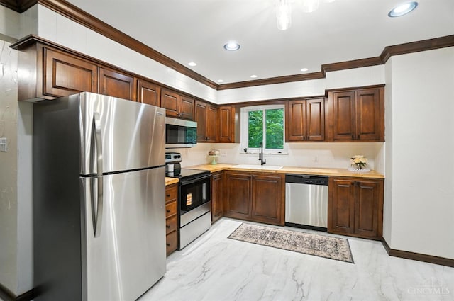 2000 Neeb Rd, Green Twp, OH 45233 - kitchen featuring appliances with stainless steel finishes, ornamental molding, light countertops, light marble finish floors, and recessed lighting