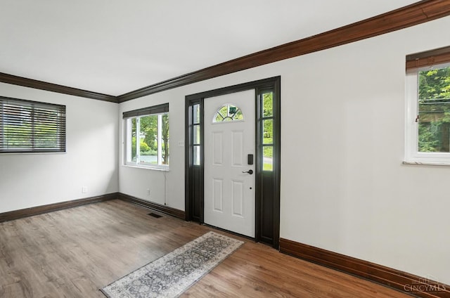 2000 Neeb Rd, Green Twp, OH 45233 - entrance foyer featuring crown molding and wood finished floors