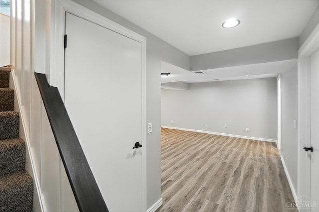2000 Neeb Rd, Green Twp, OH 45233 - below grade area featuring light wood finished floors, stairway, and recessed lighting